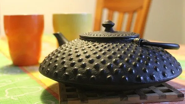 cropped iron teapot