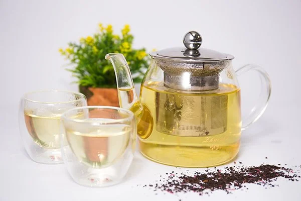 A glass teapot with infuser
