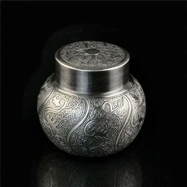 Silver tea container has an exquisite appearance  but  expensive