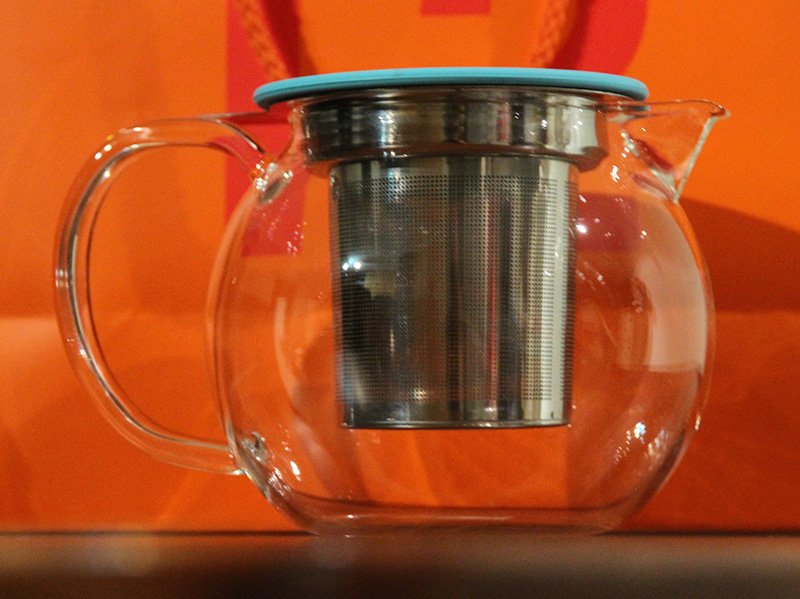 The glass teapot with a detachable infuser inside