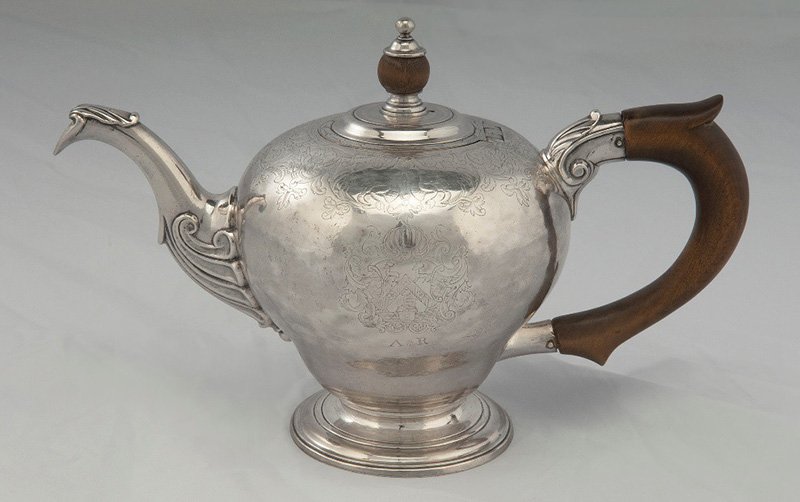 The silver teapot with light oxidation