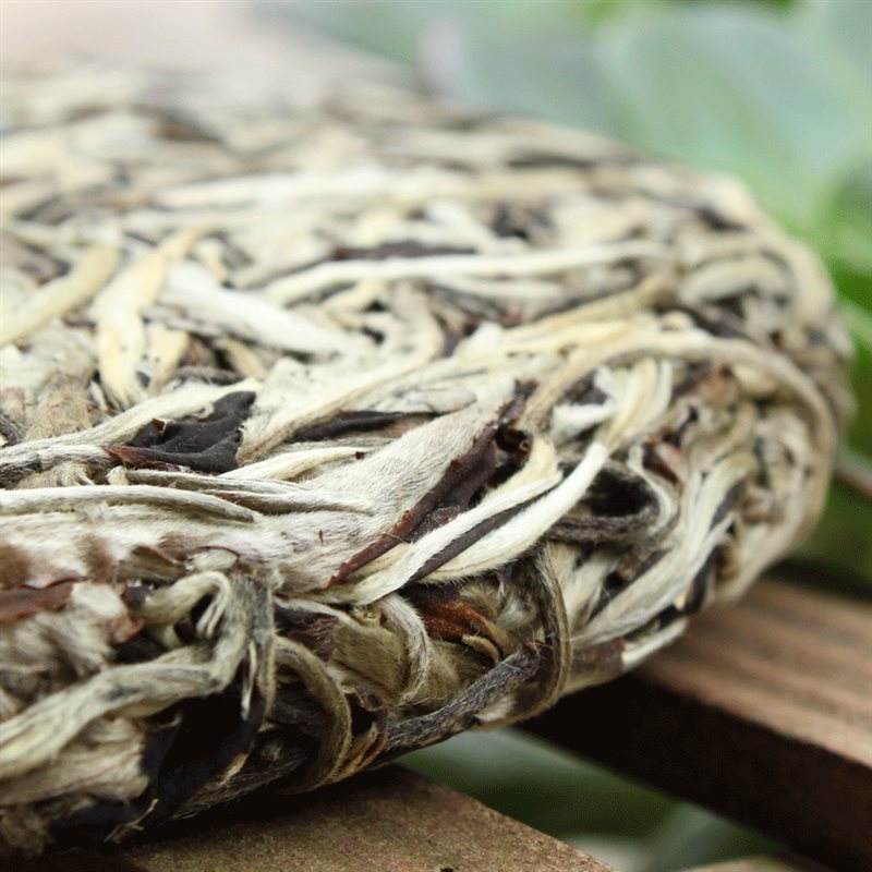 Most moonlight white tea is pressed into cake for sale