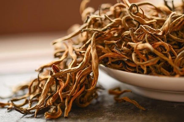 Yunnan Dianhong tea usually sold in a whole-leaf tea style